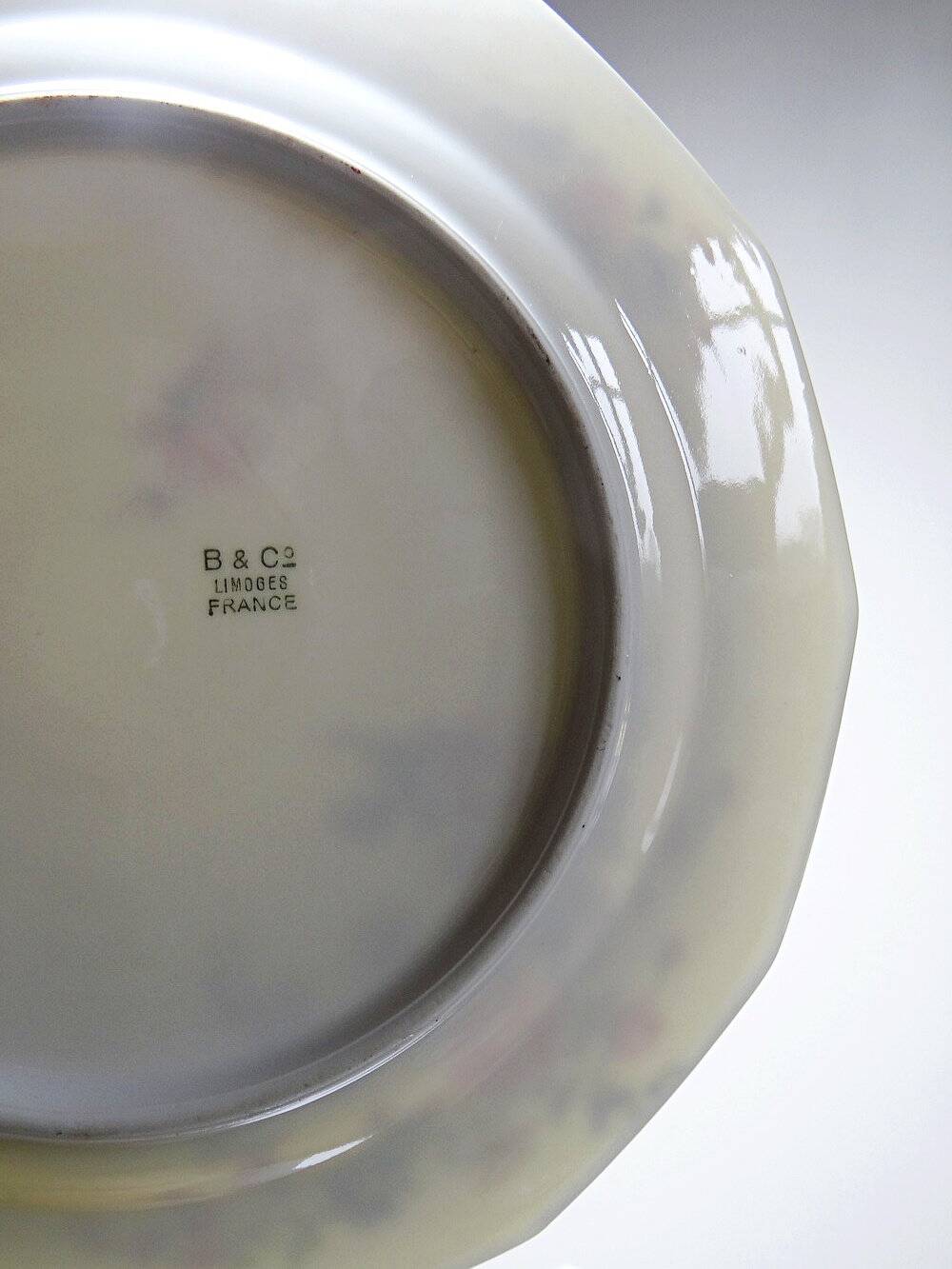 4 Bernardaud Limoges porcelain dinner plates with floral decoration, 1920s-1950s