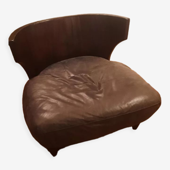 Ebony wood and leather armchair