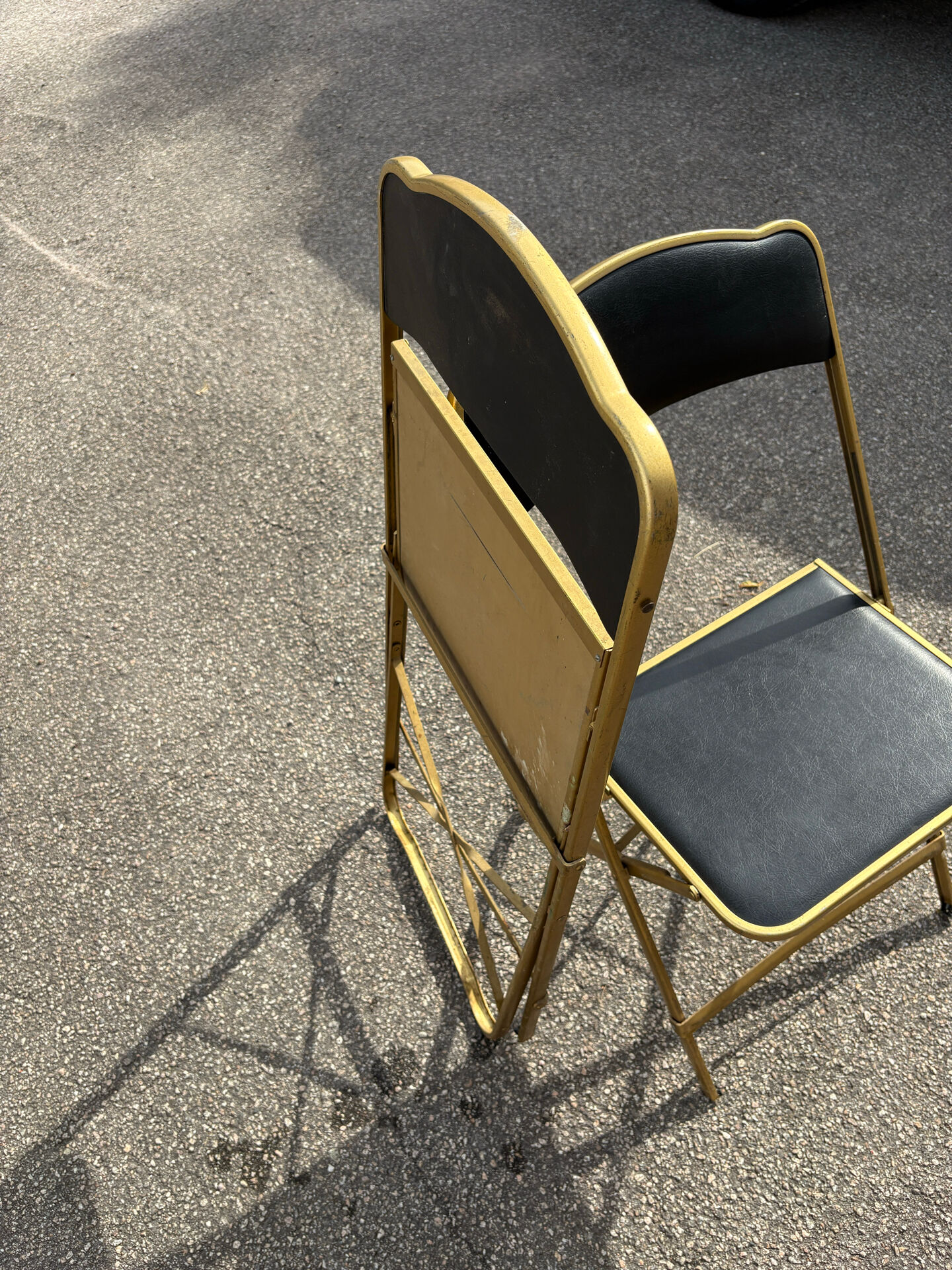 Two chairs, similar black