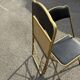 Two chairs, similar black