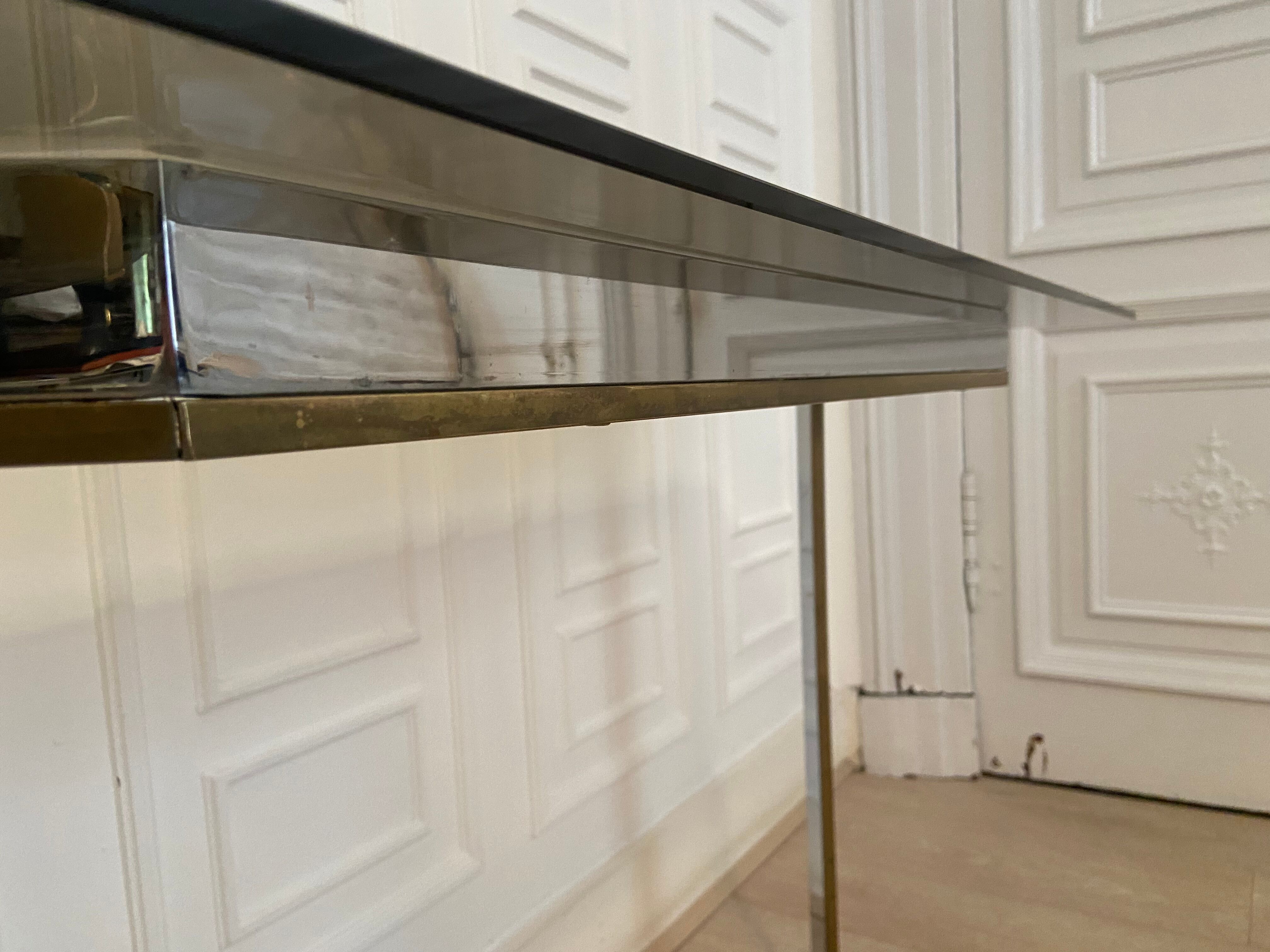 Pair of chrome metal consoles and smoked glass, Italy, 1970s