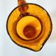 Blown glass pitcher with bubbles from Biot – amber colour