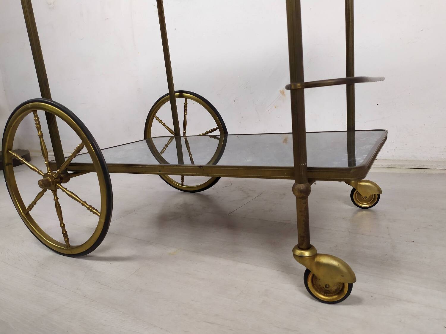 Brass and glass rolling trolley
