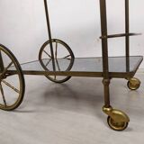 Brass and glass rolling trolley