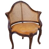 Fauteuil de bureau louis xv, sculpté, canné, garni cuir