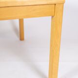 Coffee table in beech of danish design from the 1960s.