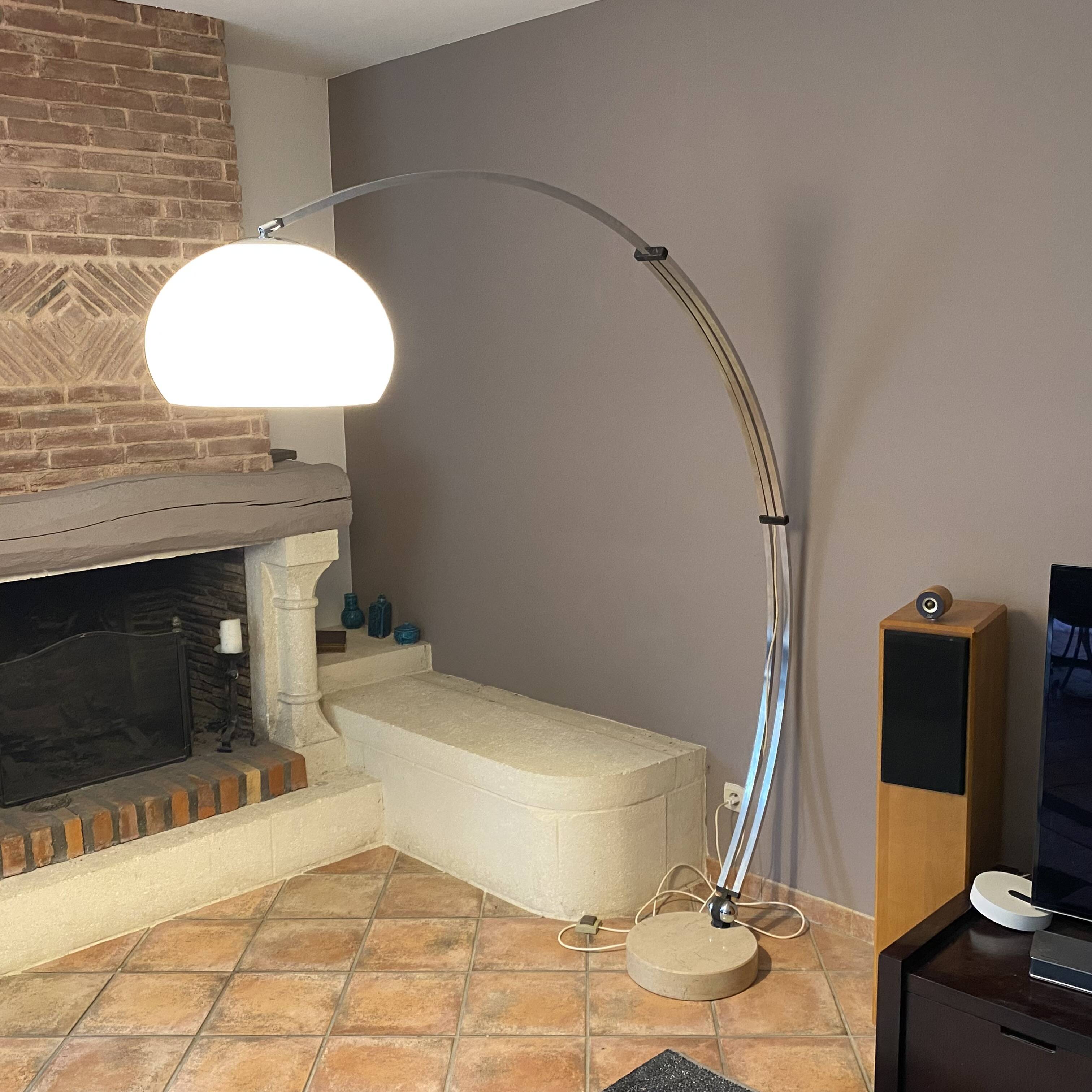 Guzzini arc floor lamp. 1970. Italy. Marble base.