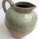 Blue enamelled sandstone pitcher and ochre streaks