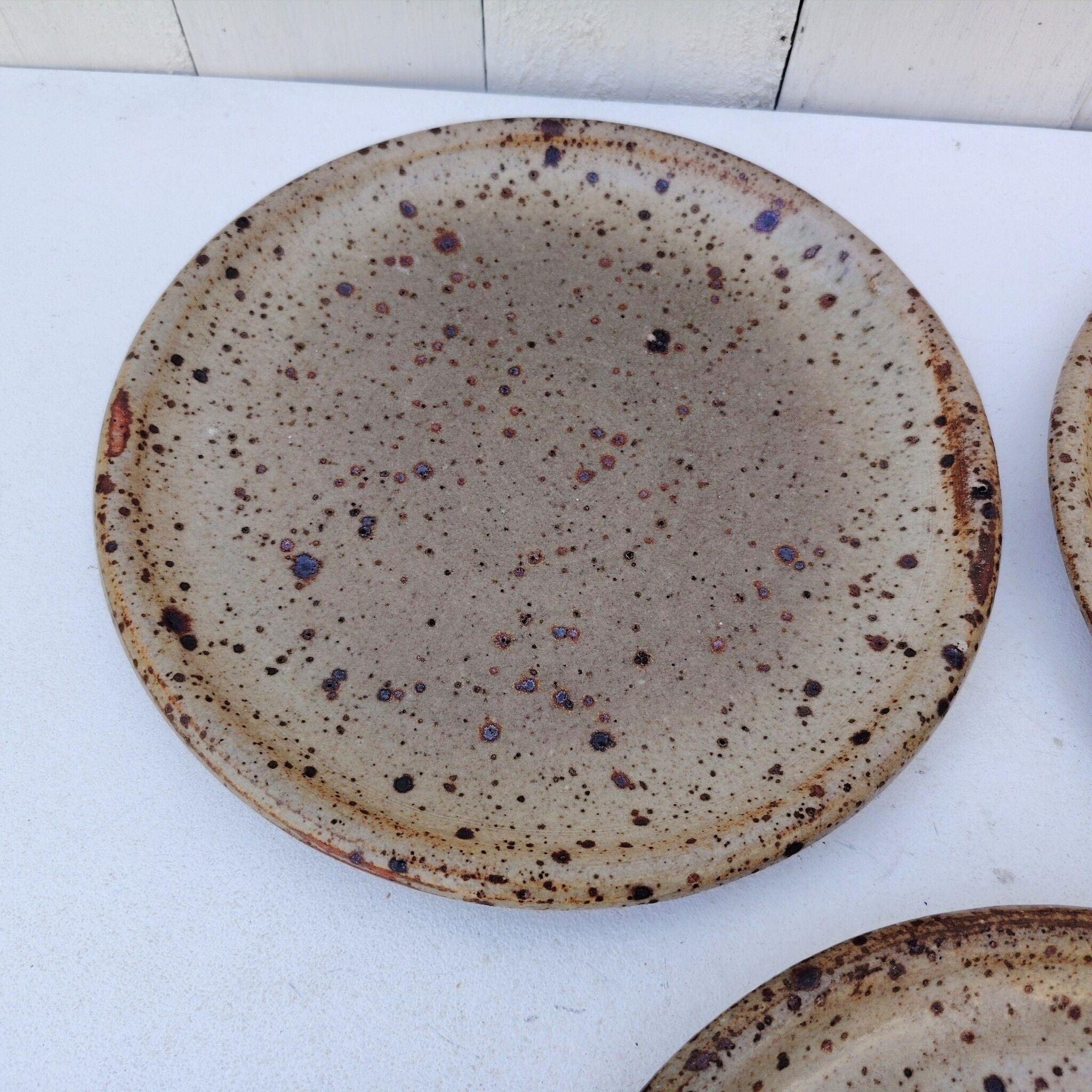 Three stoneware plates, Tiffoche, La Borne Guérande