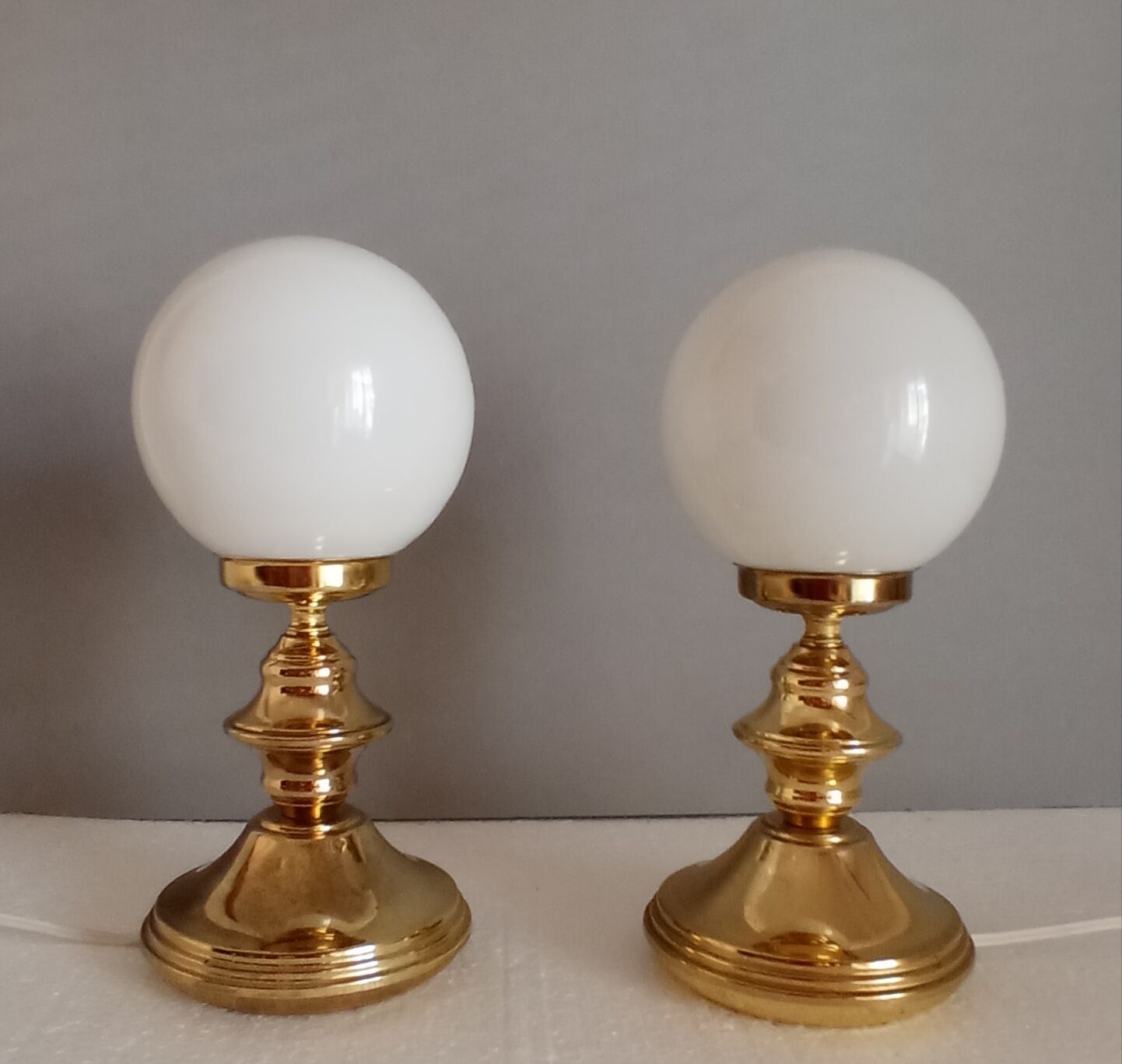 Pair of golden lamps