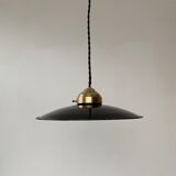 Old black enamelled industrial suspension
