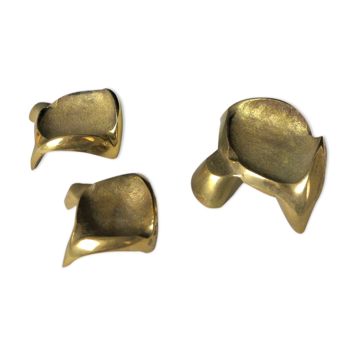 Suite of three bronze "ray"