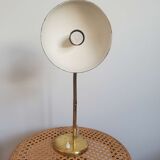 Golden hinged desk lamp