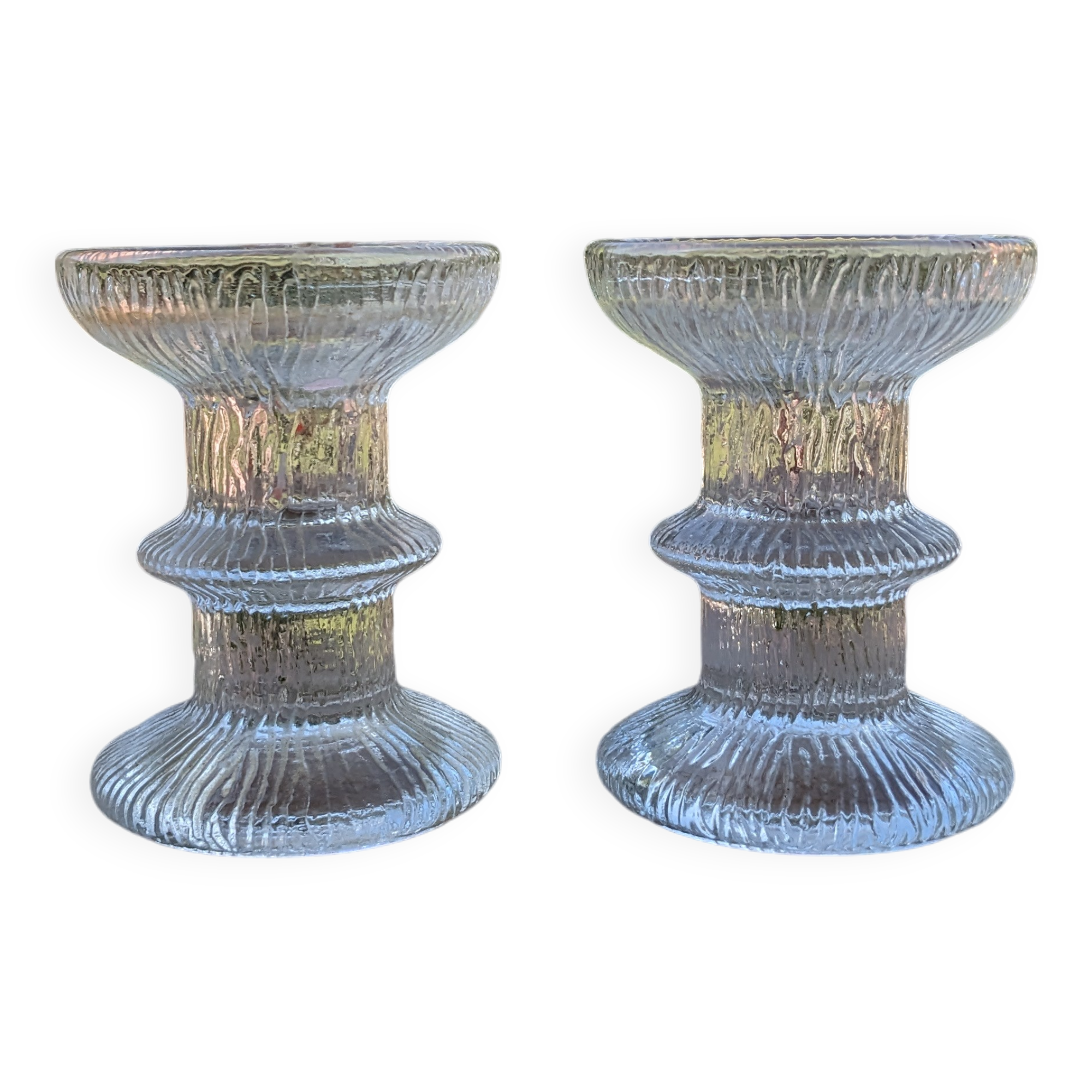 Pair of Luminarc candlesticks in chiseled glass.