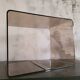 Rectangular piece of furniture or coffee table in smoked plexiglass by Michel Dumas.