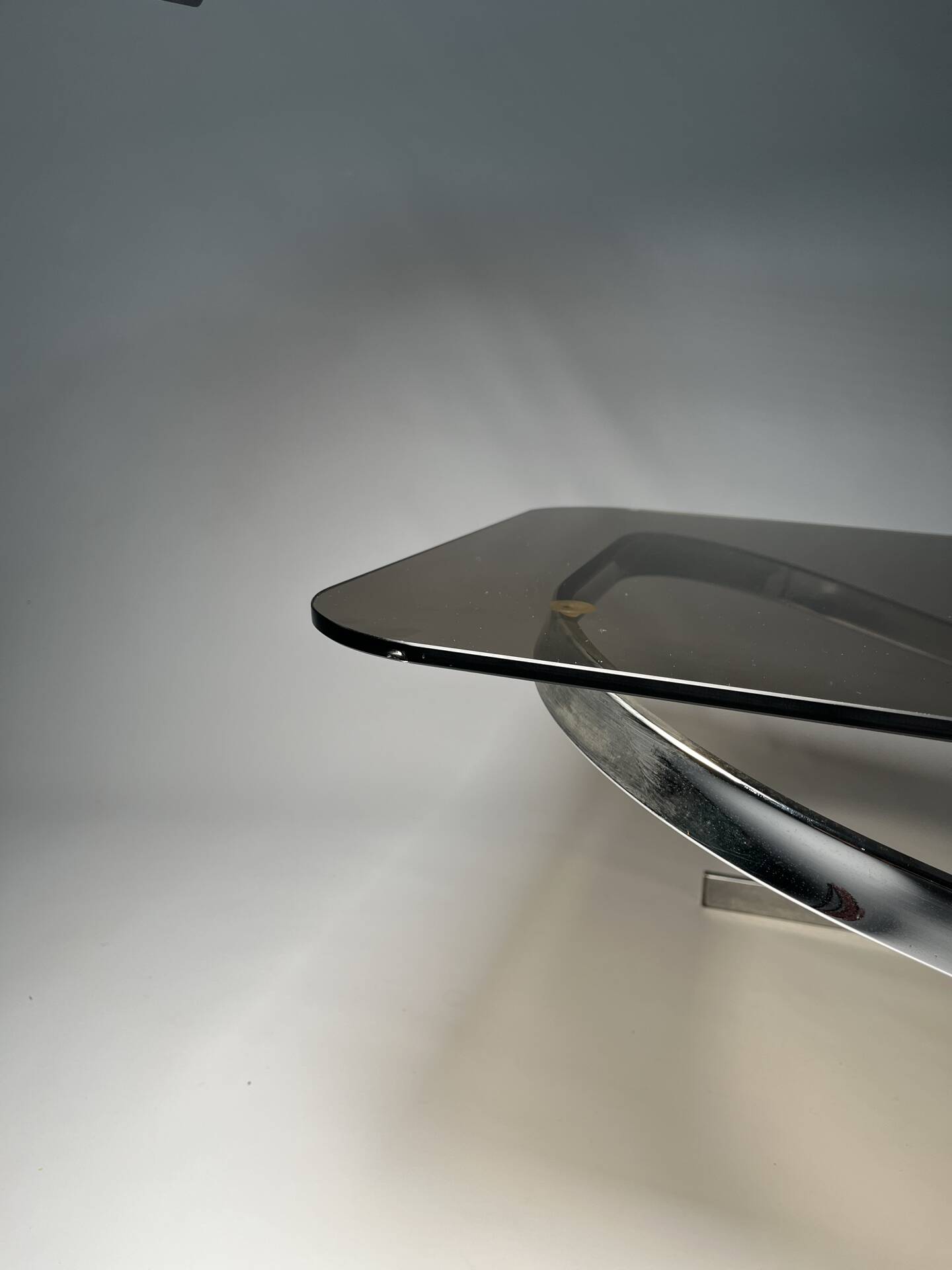 Vintage coffee table in chrome and smoked glass, 1970s.