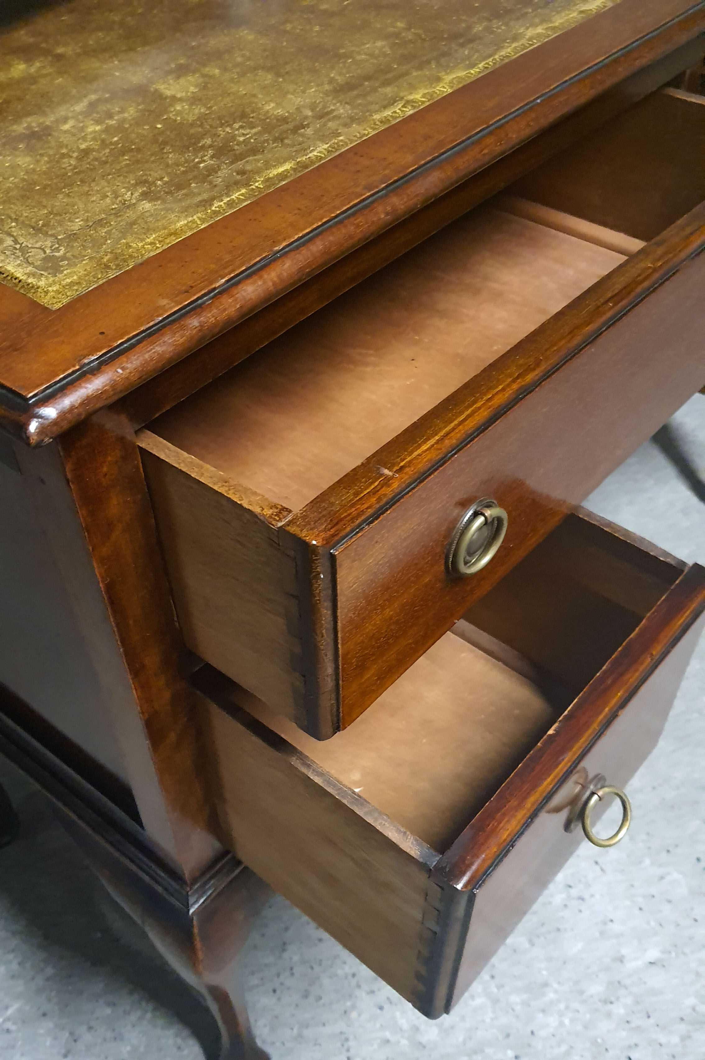 Old desk in cherry and green leather
