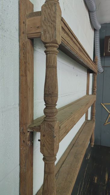 Old oak shelf back of glass counter wall