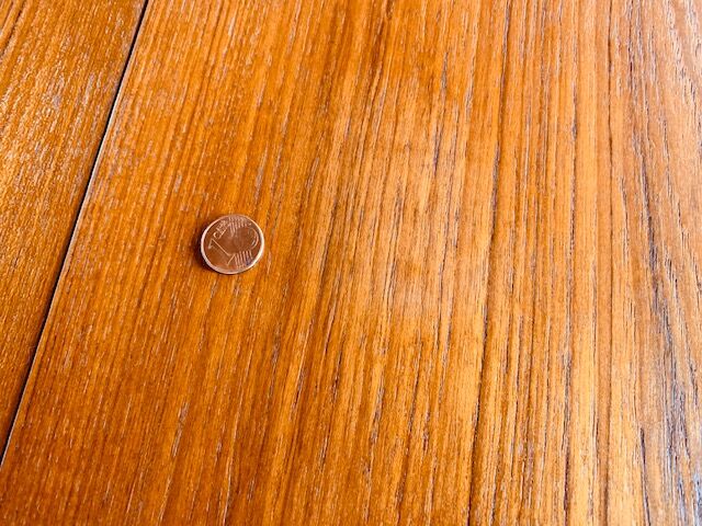 Expandable teak dining table, butterfly extension, circa 60s