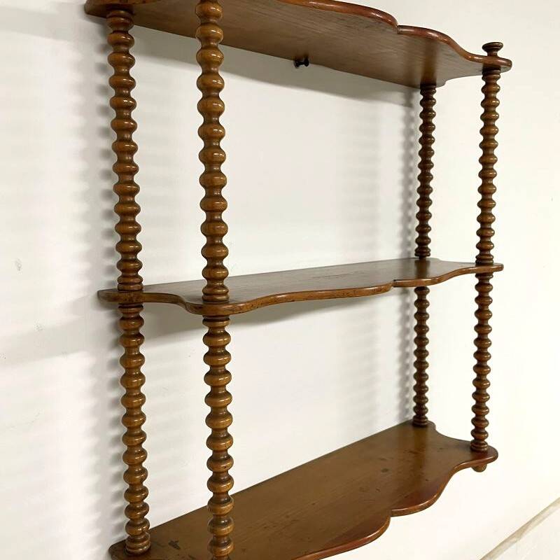 Vintage turned wood wall shelf with 3 levels.