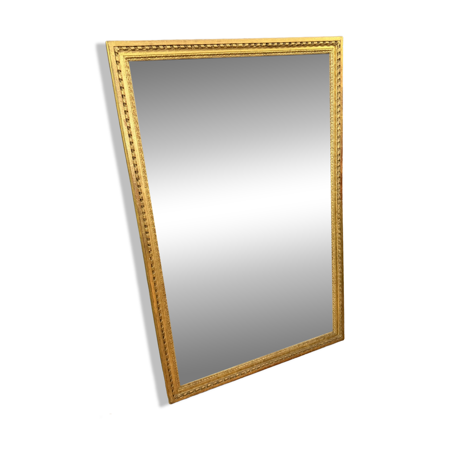 Louis XVI mirror in gilded wood, 18th century.