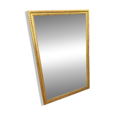 Louis XVI mirror in gilded wood, 18th century.