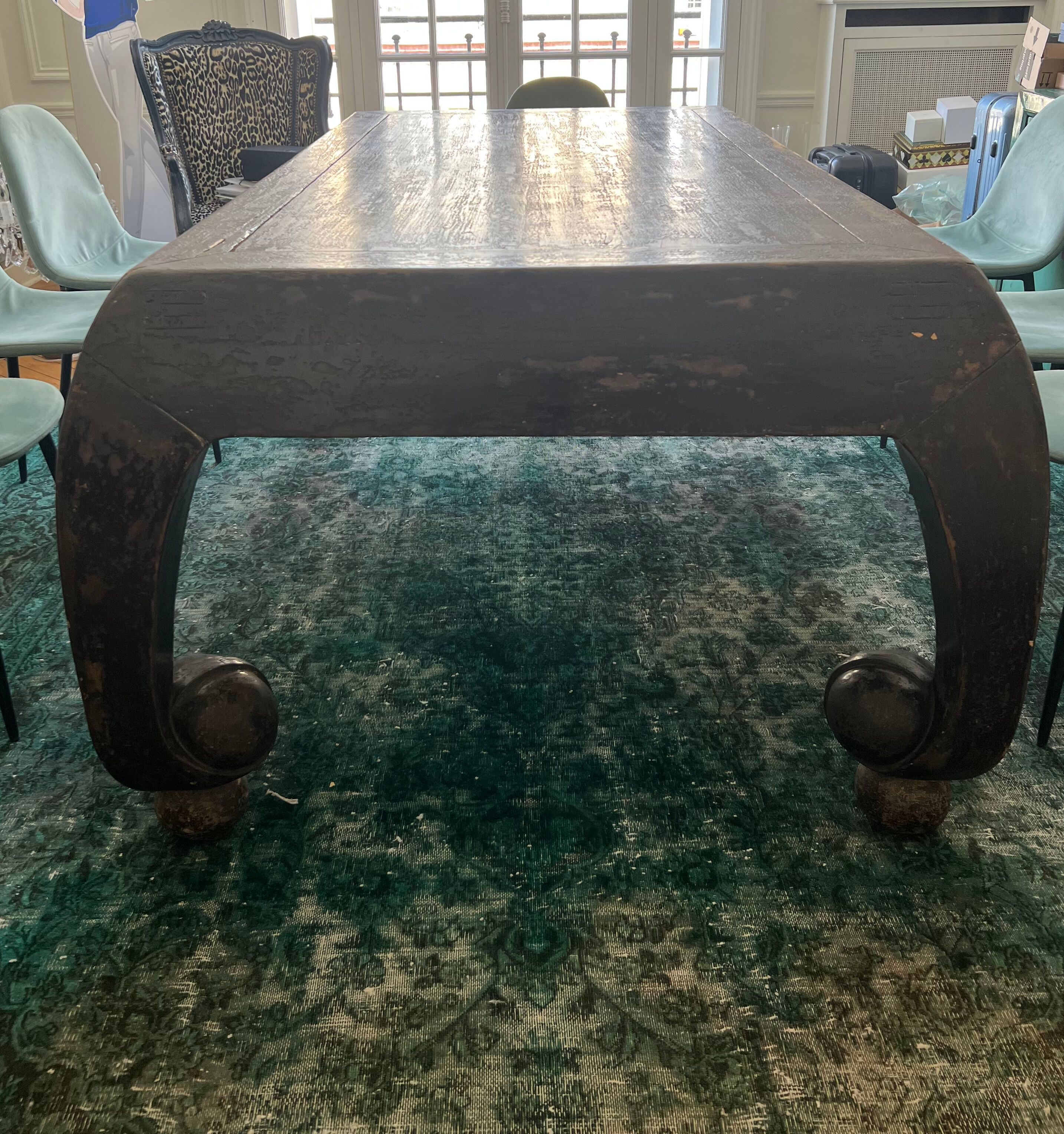 Large antique Chinese black table made of patinated solid wood.