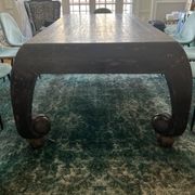 Large antique Chinese black table made of patinated solid wood.