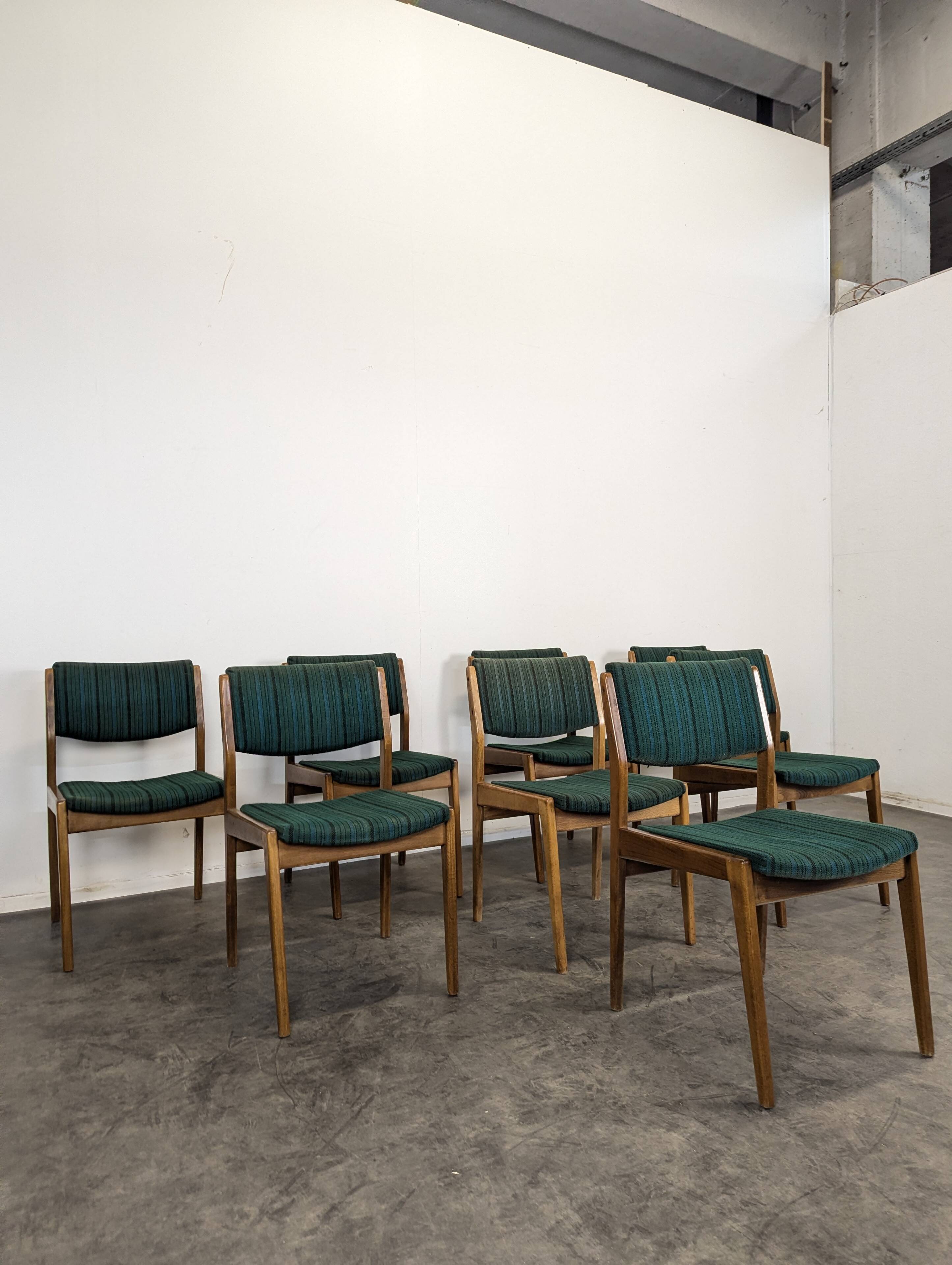 Set of 8 vintage green fabric chairs.