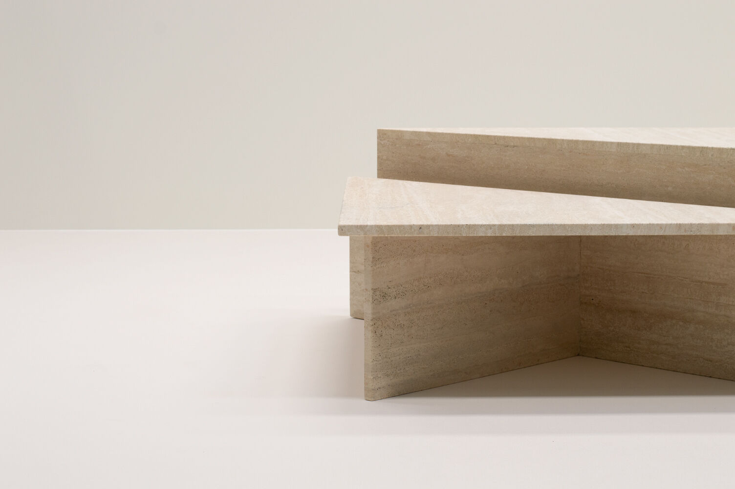 Up&Up triangle travertine coffee table, Italy 70s