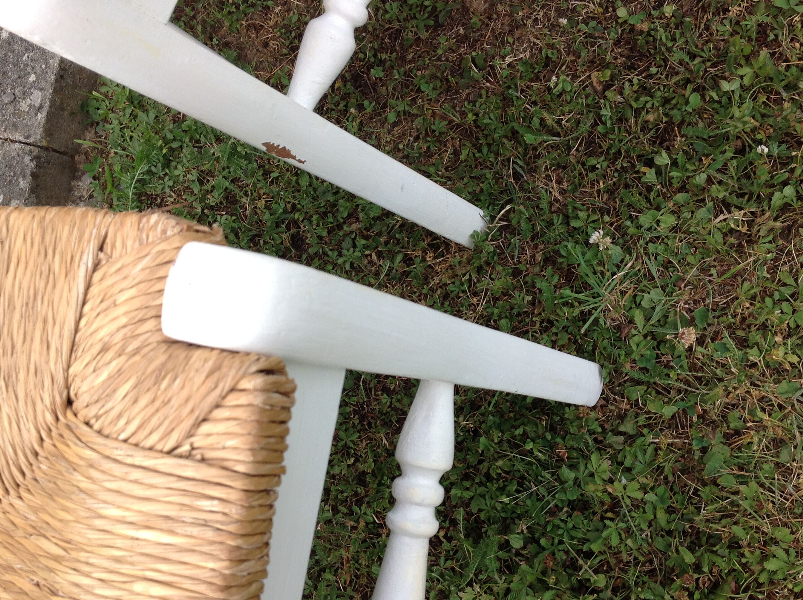 White farmhouse table set and four chairs