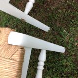 White farmhouse table set and four chairs