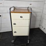 Mid-20th century metal cabinet table on wheels