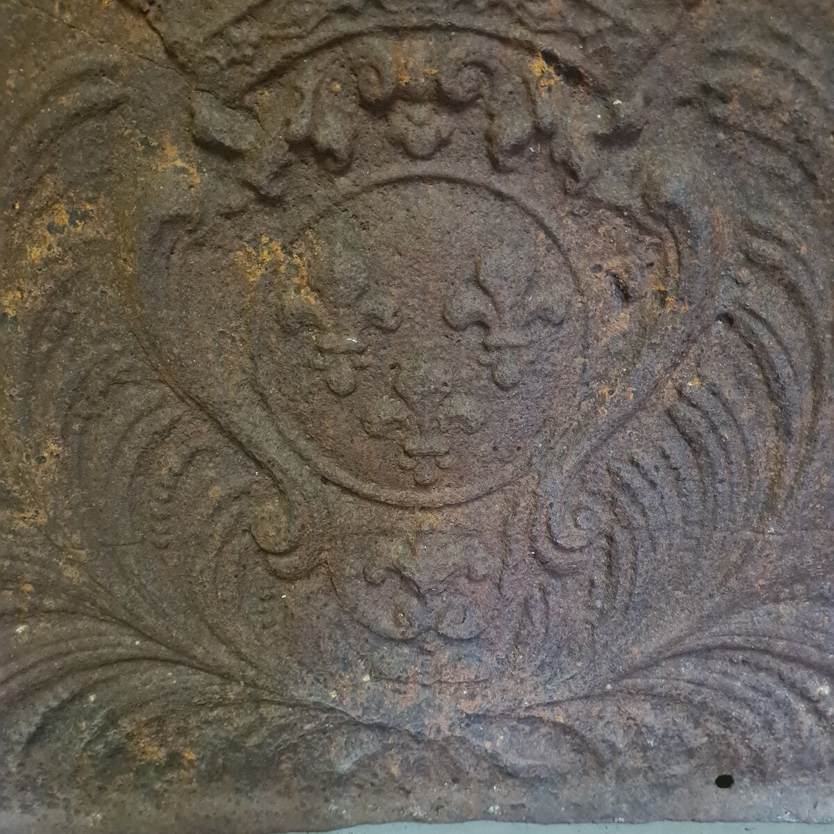 Cast iron fireback with the crowned arms of France