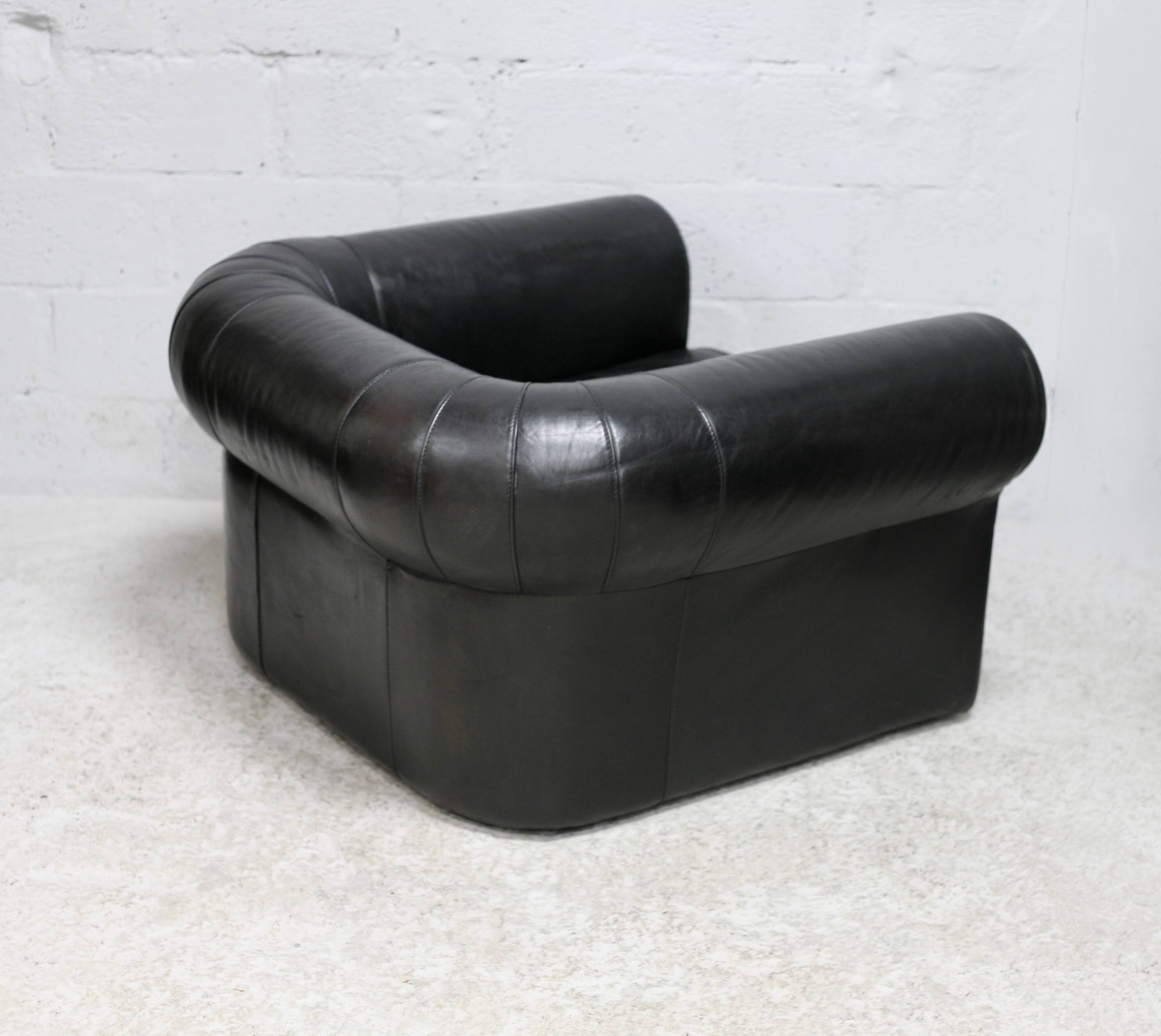Large black leather armchair, France, 1980s