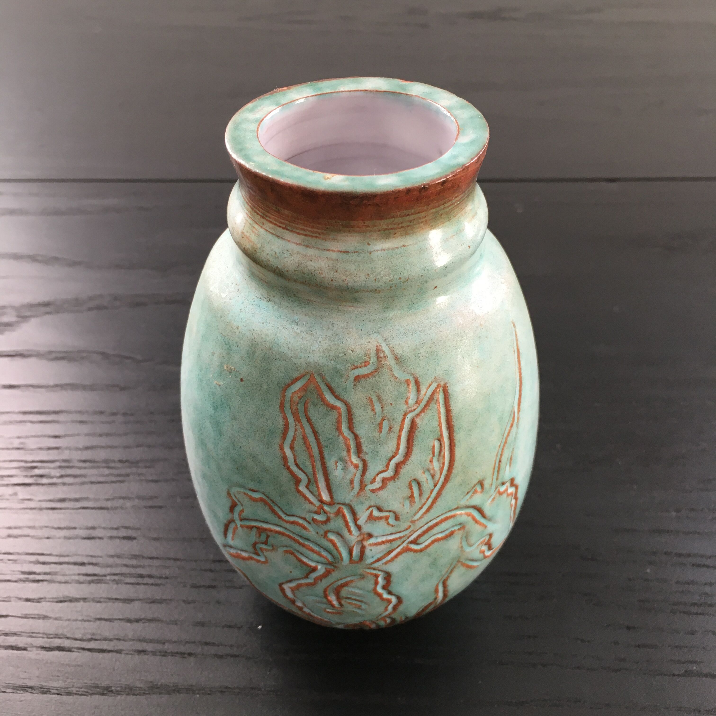 Turquoise vase with iris decoration