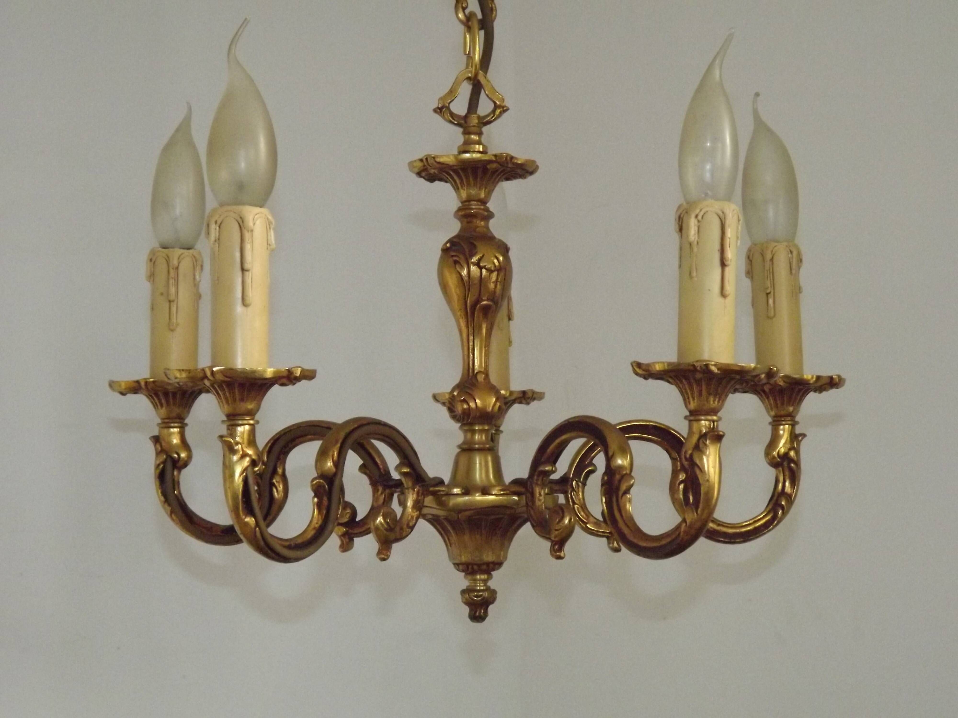 Vintage French traditional style bronze chandelier with 5 lights featuring acanthus leaf details.