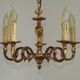 Vintage French traditional style bronze chandelier with 5 lights featuring acanthus leaf details.