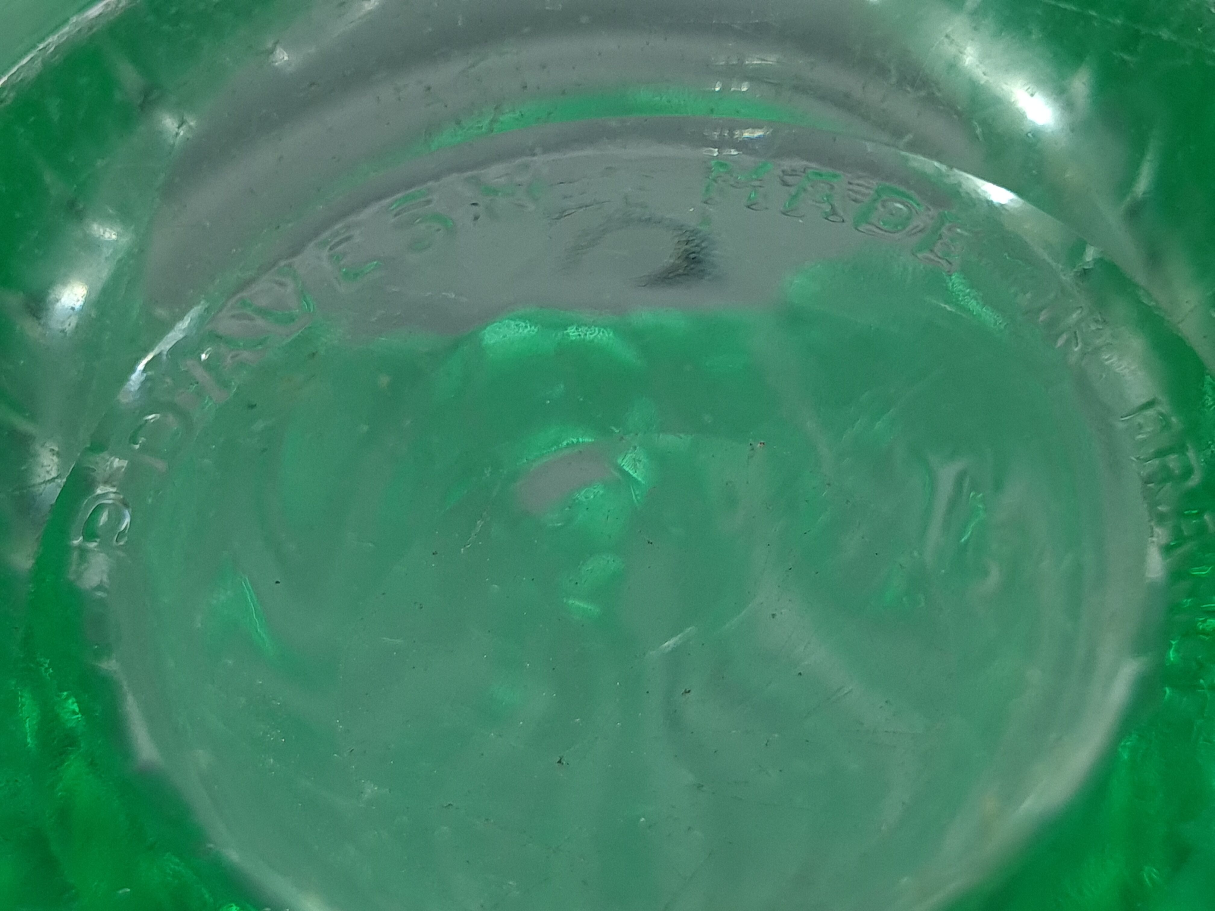 Molded pressed glass vase by Pierre D'Avesn around 1930. Signed