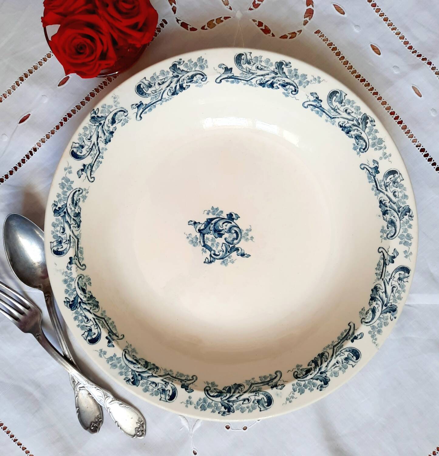 Old mismatched dinner plates accompanied by a dish