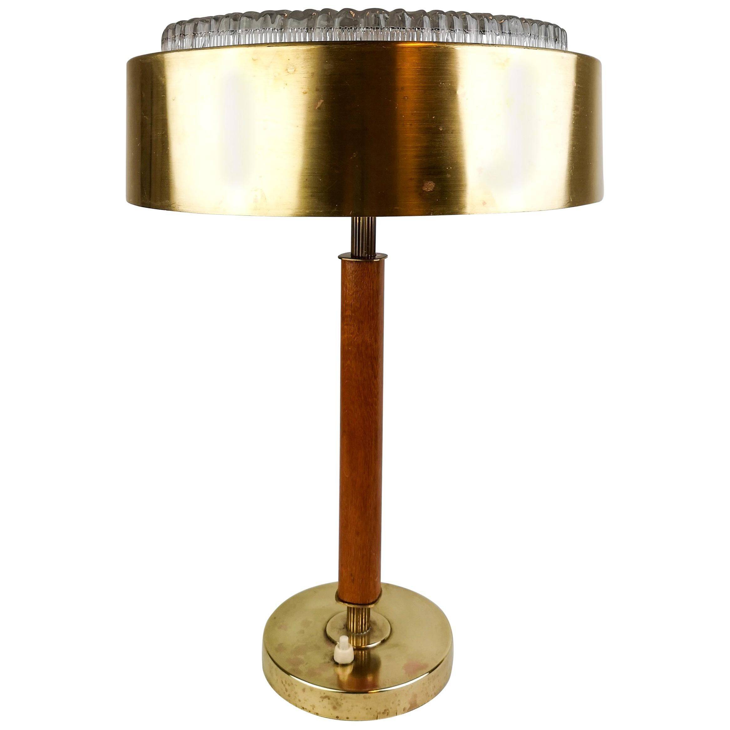 Mid-century Swedish table lamp in brass, crystal, and wood by Boréns.
