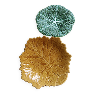 Two earthenware plates, a vine leaf and a cabbage slip