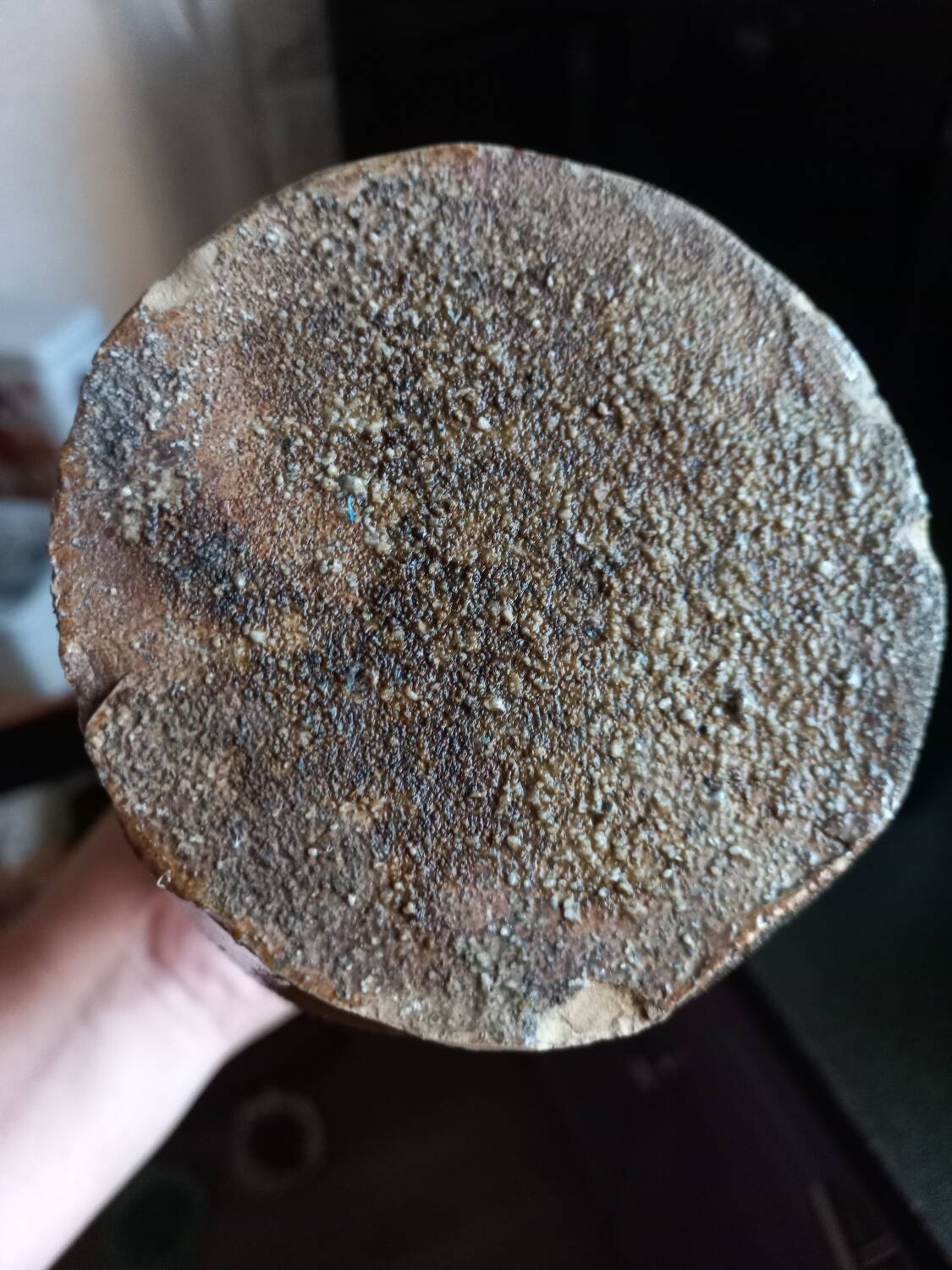 Old bottle of mineral water in salt stoneware