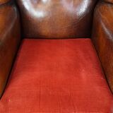 Set of 2 sheep leather wingback chairs with red corduroy seat cushions
