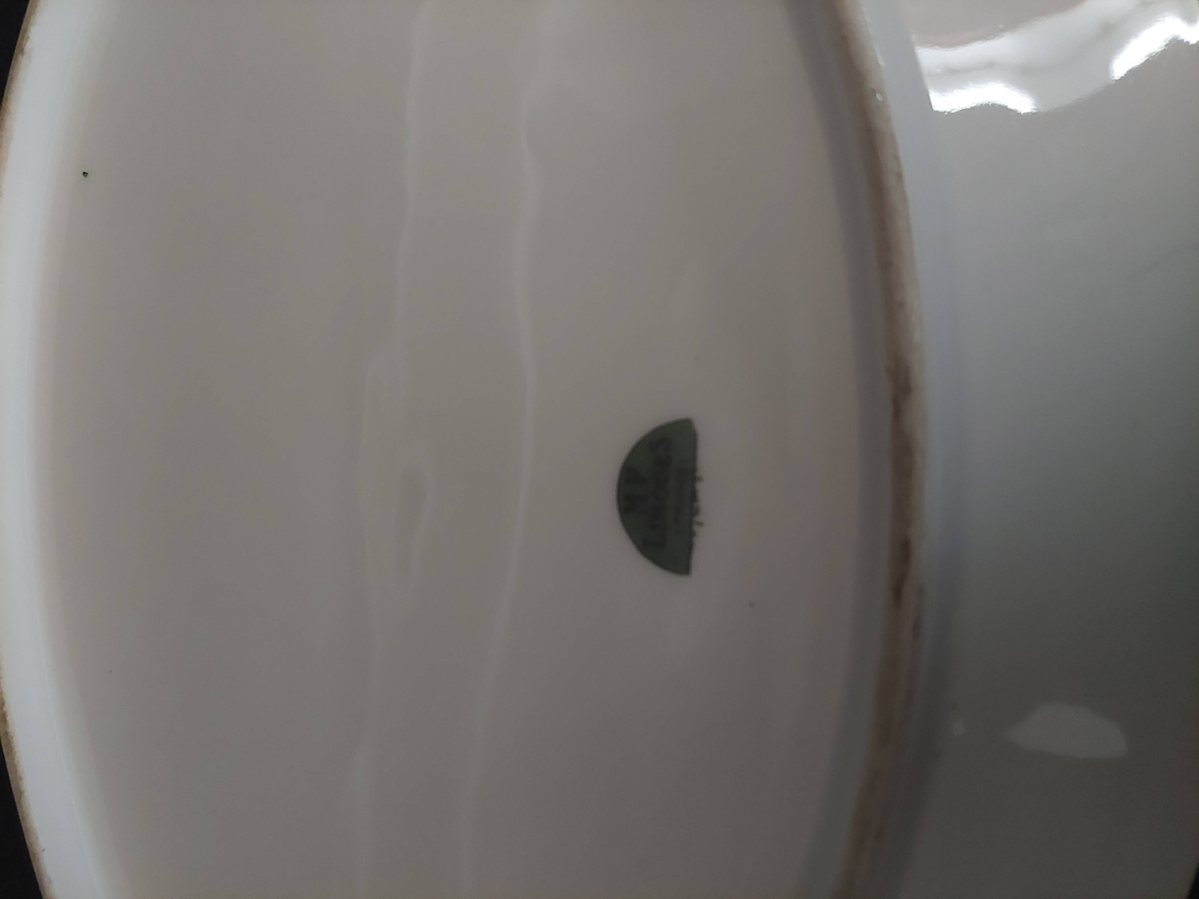 Oval porcelain serving dish decorated with roses MF Limoges