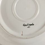 Empty pocket decorated with red and blue flowers