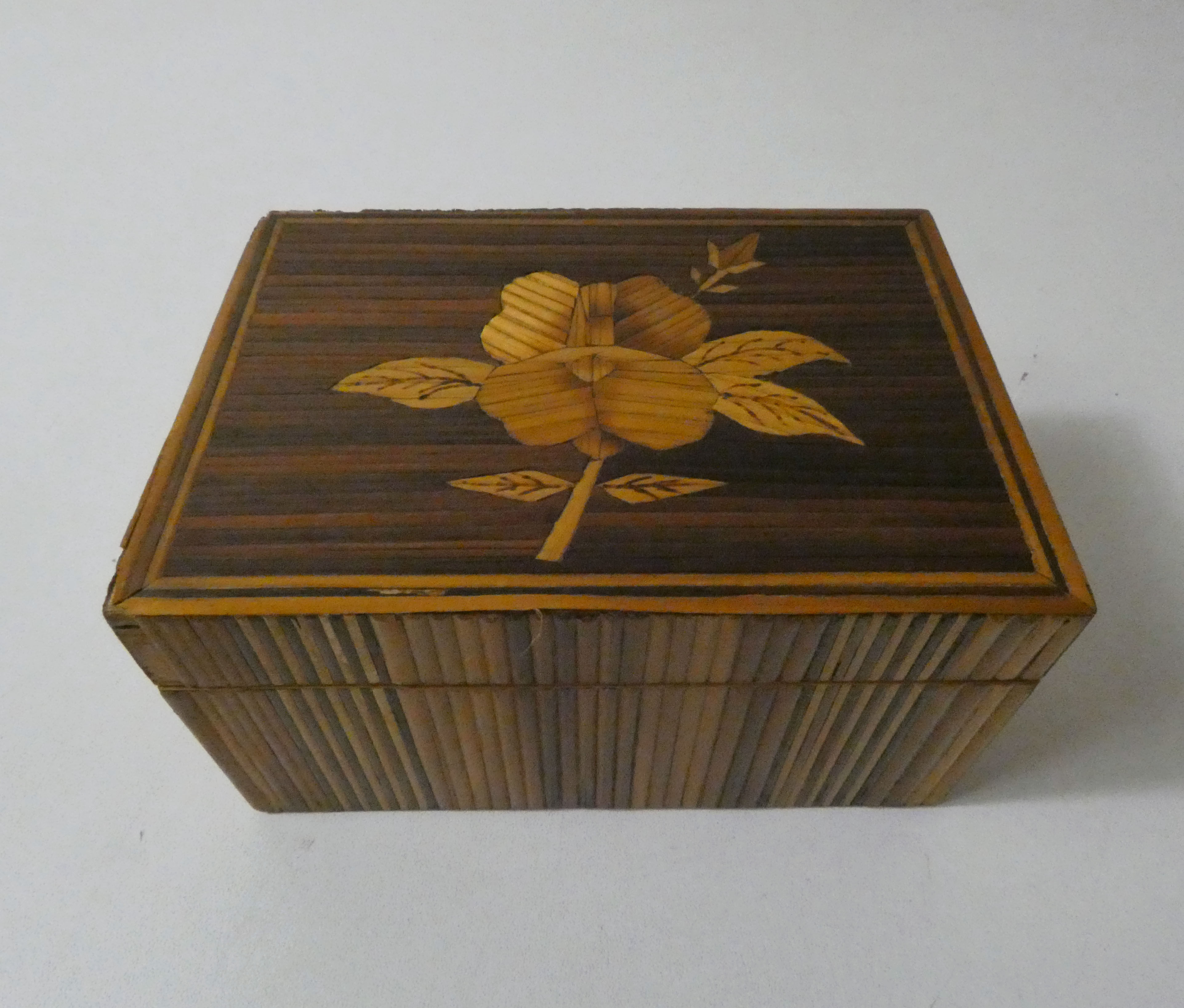 Old trundle boxes in straw marquetry