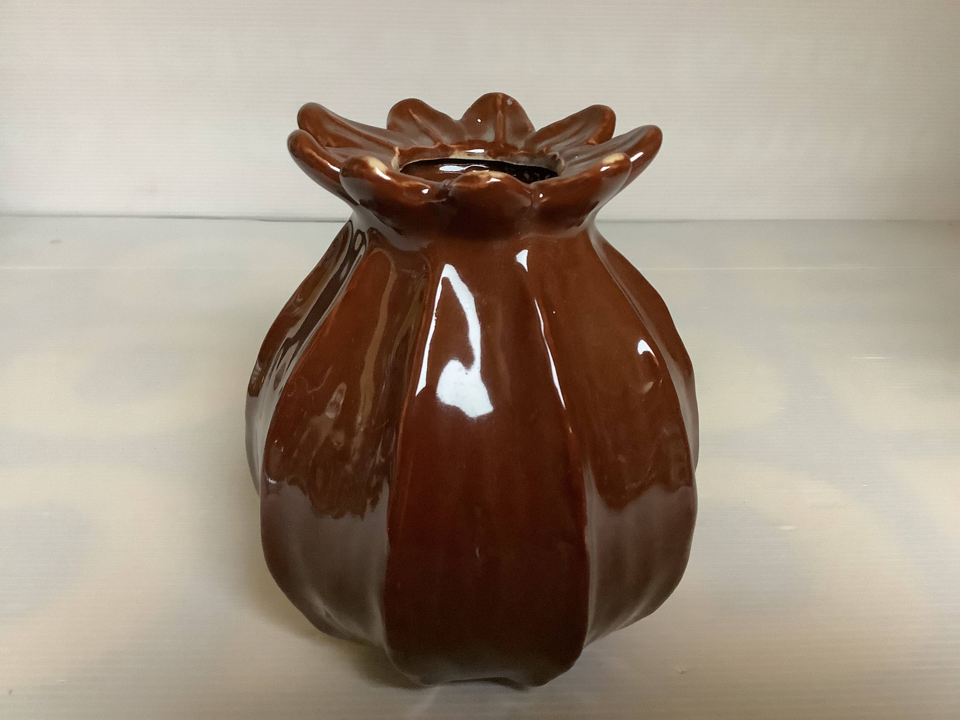 Brown ceramic corolla vase