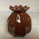 Brown ceramic corolla vase