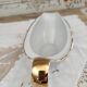 White porcelain saucière evor france frieze golden crosses